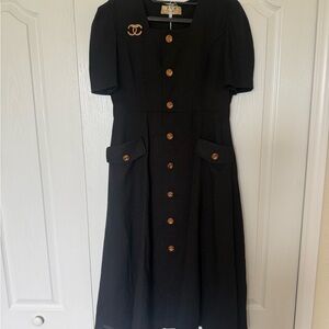 Elegant Black Midi Dress with Gold Accents